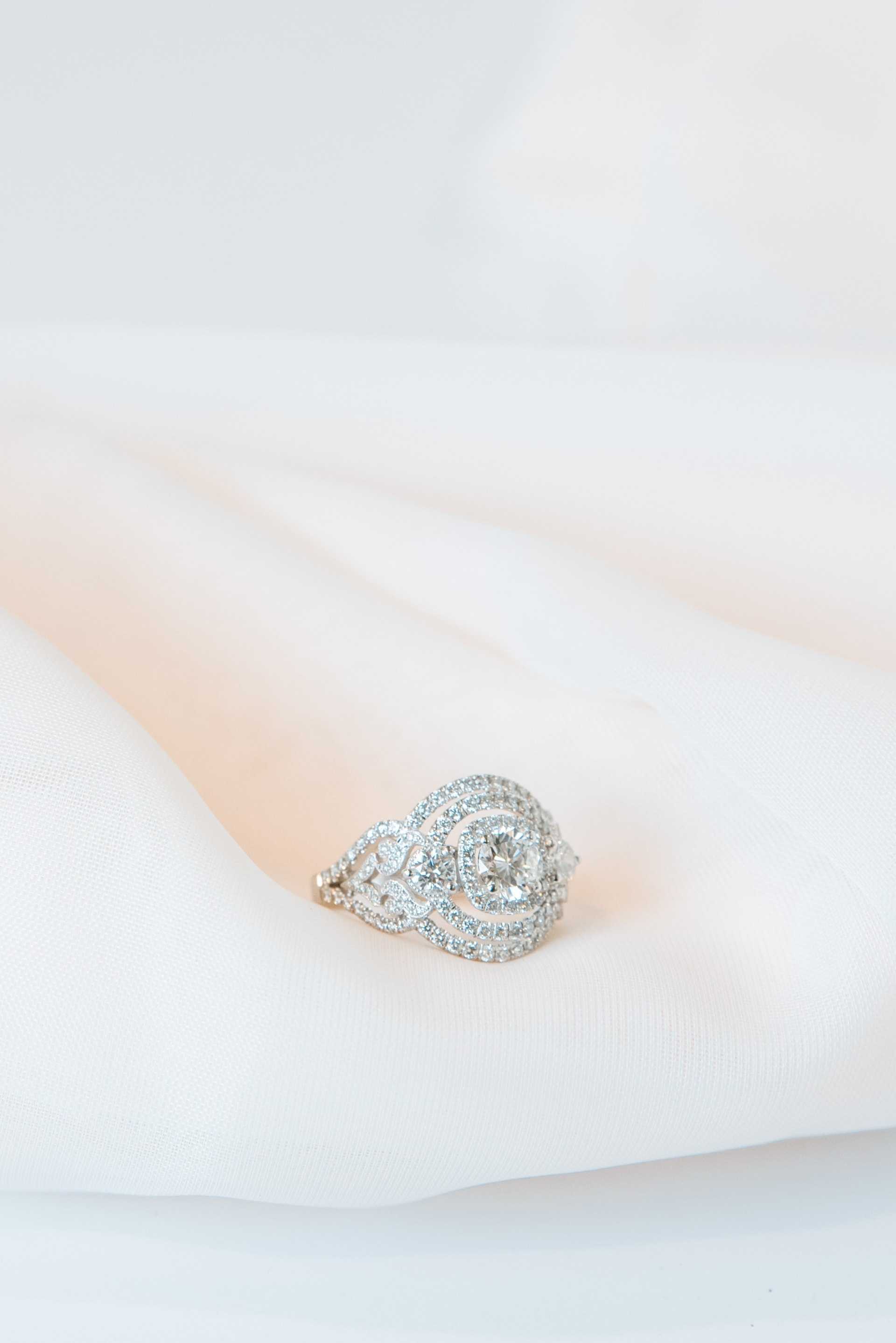Pear-shaped diamond halo ring