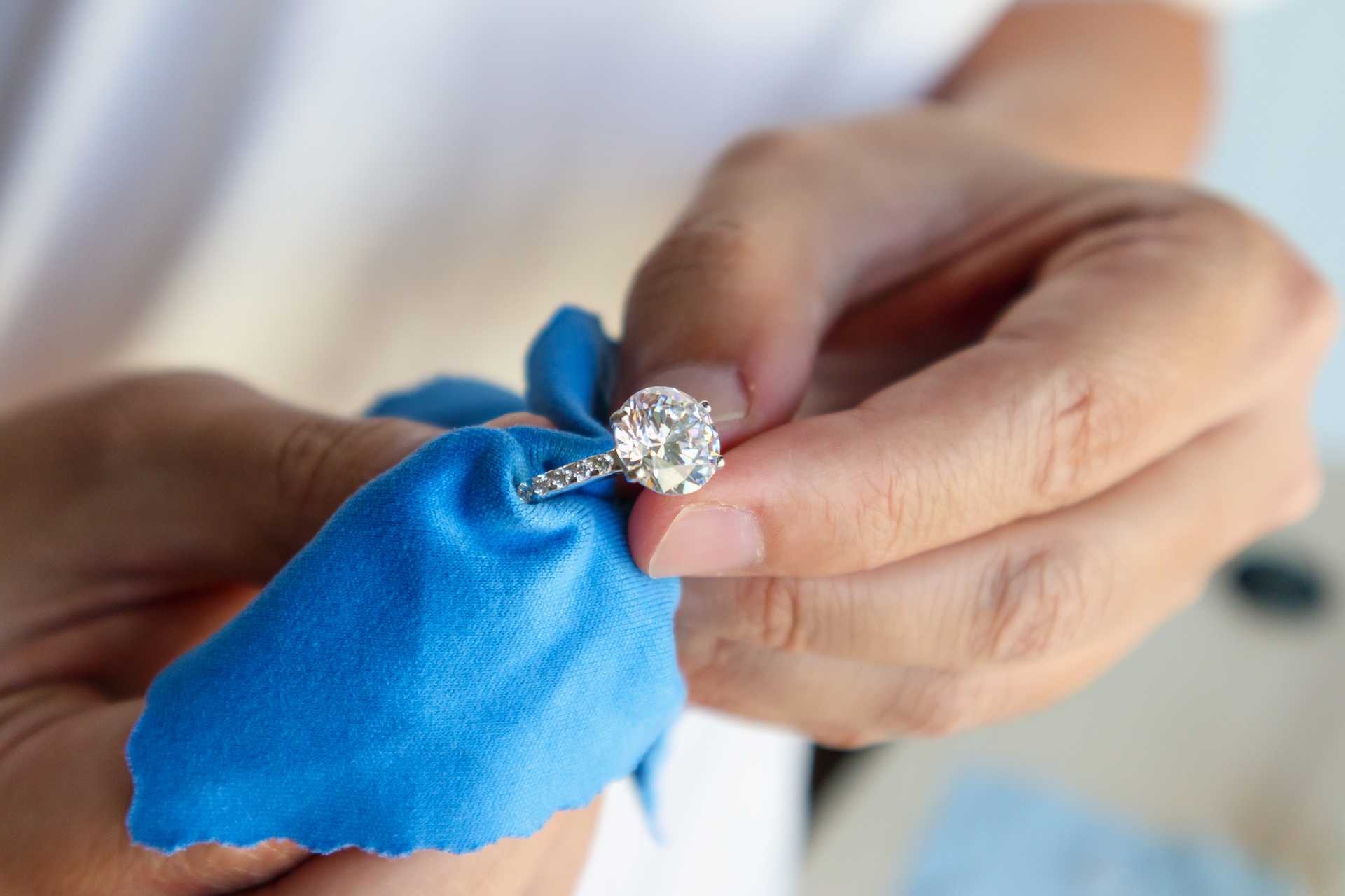 Hand polishing a ring